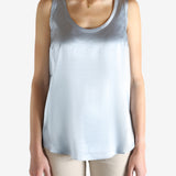 Grey t-shirts worn by a person, showing the t-shirts fit