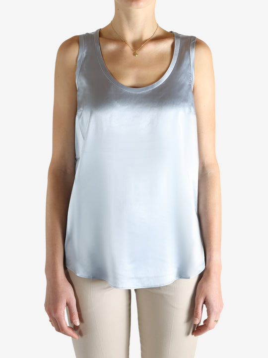 Grey t-shirts worn by a person, showing the t-shirts fit