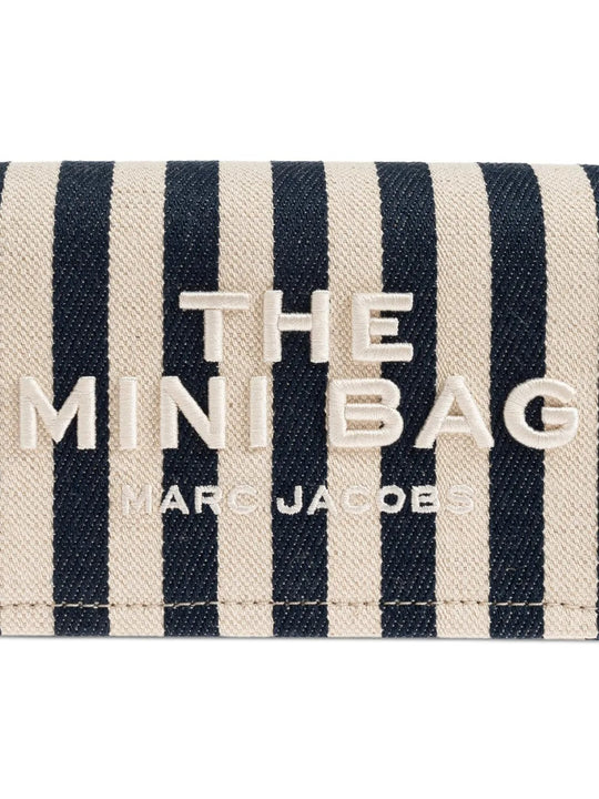 Close up of the blue bag, showing texture of the cotton fabric