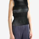 Black shirt worn by a person, showing the shirt's fit