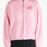 Pink hoodie worn by a person, showing the hoodie's fit