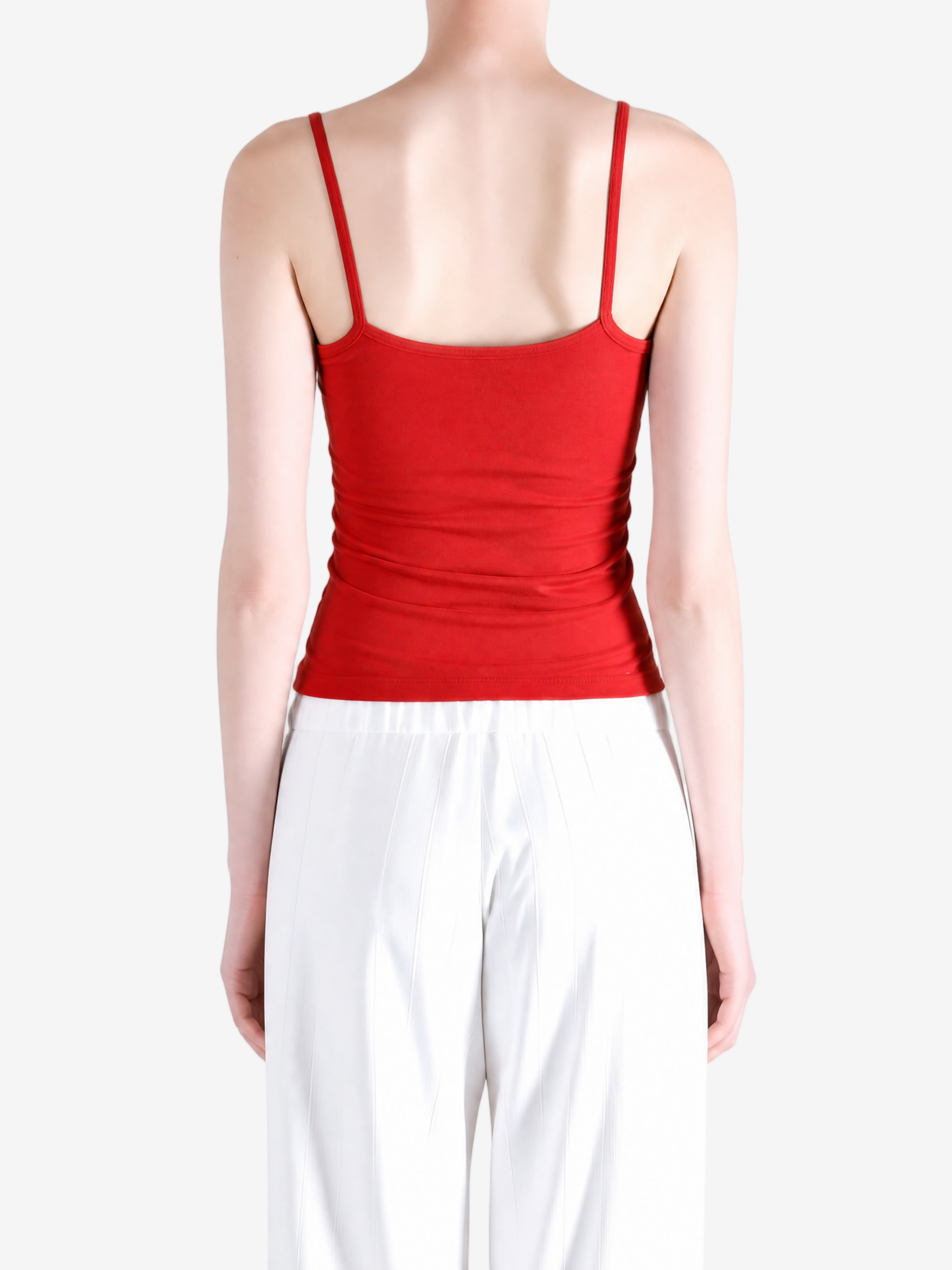 Red top worn by a person, showing the top fit
