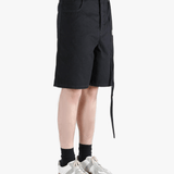 Black short worn by a person, showing the cotton fit