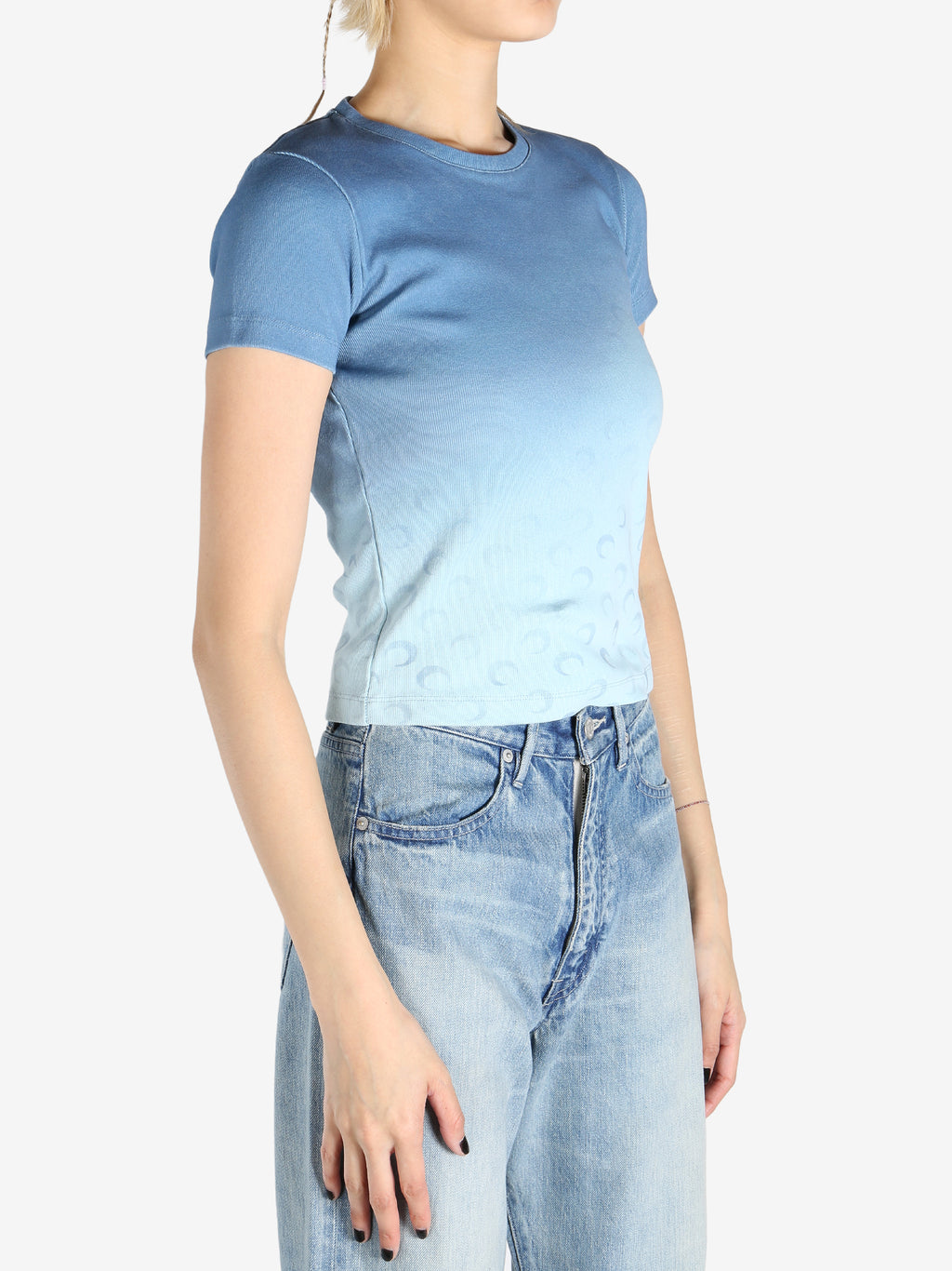 Blue t-shirts worn by a person, showing the t-shirts fit