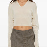Tan top worn by a person, showing the top fit