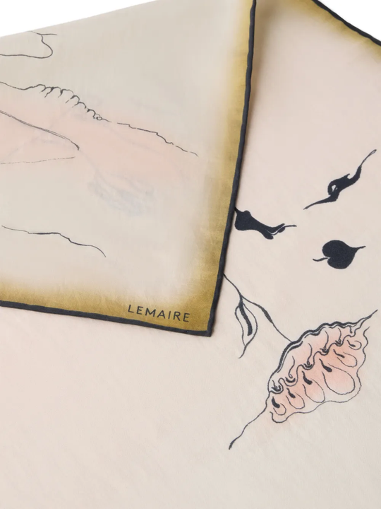 Close up of tan scarves, showing texture of the Silk fabric