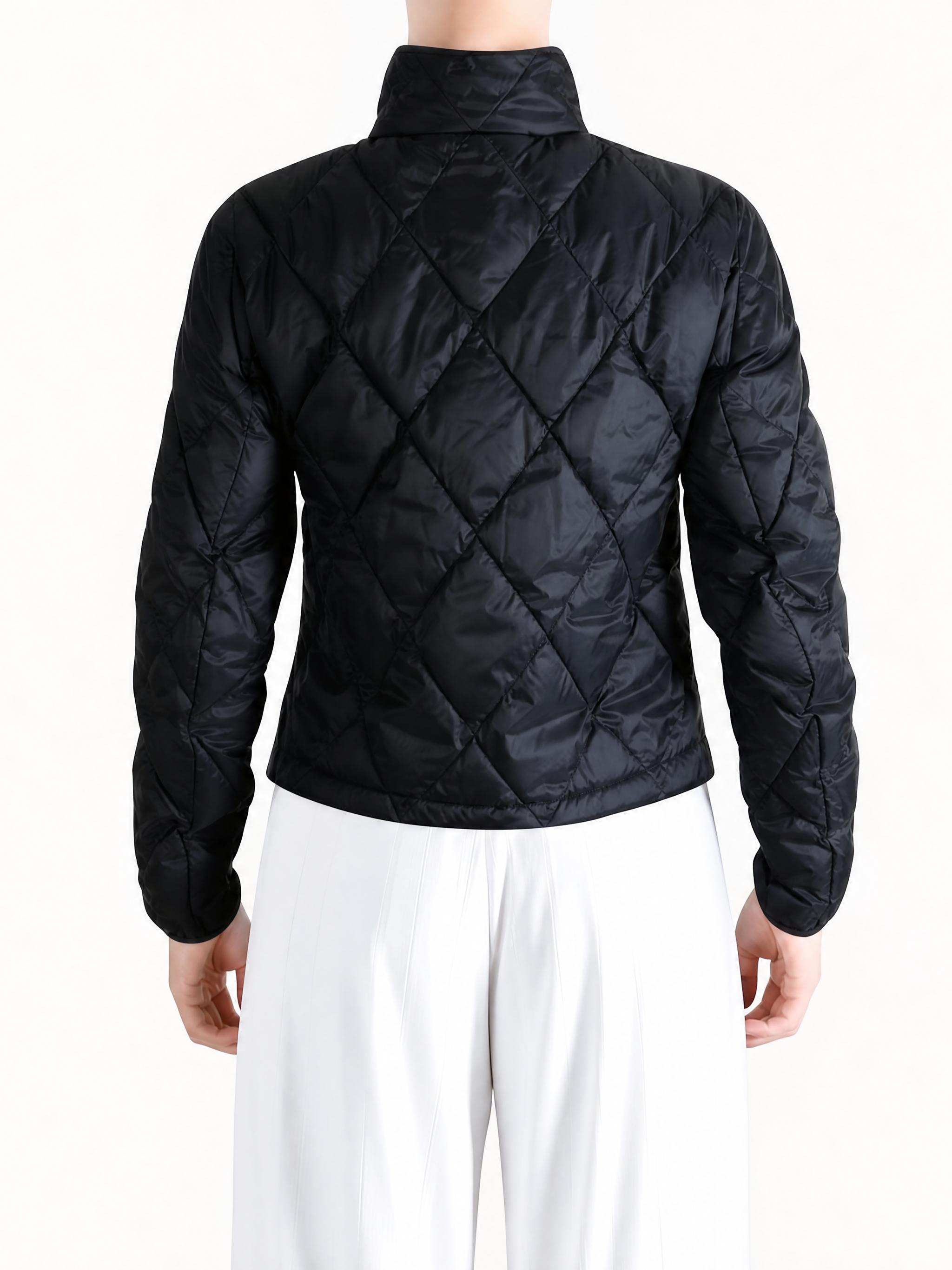Black jacket worn by a person, showing the jacket fit