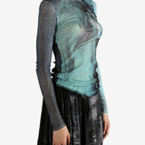 Blue top worn by a person, showing the top's fit