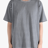 Grey t-shirt worn by a person, showing the t-shirt fit