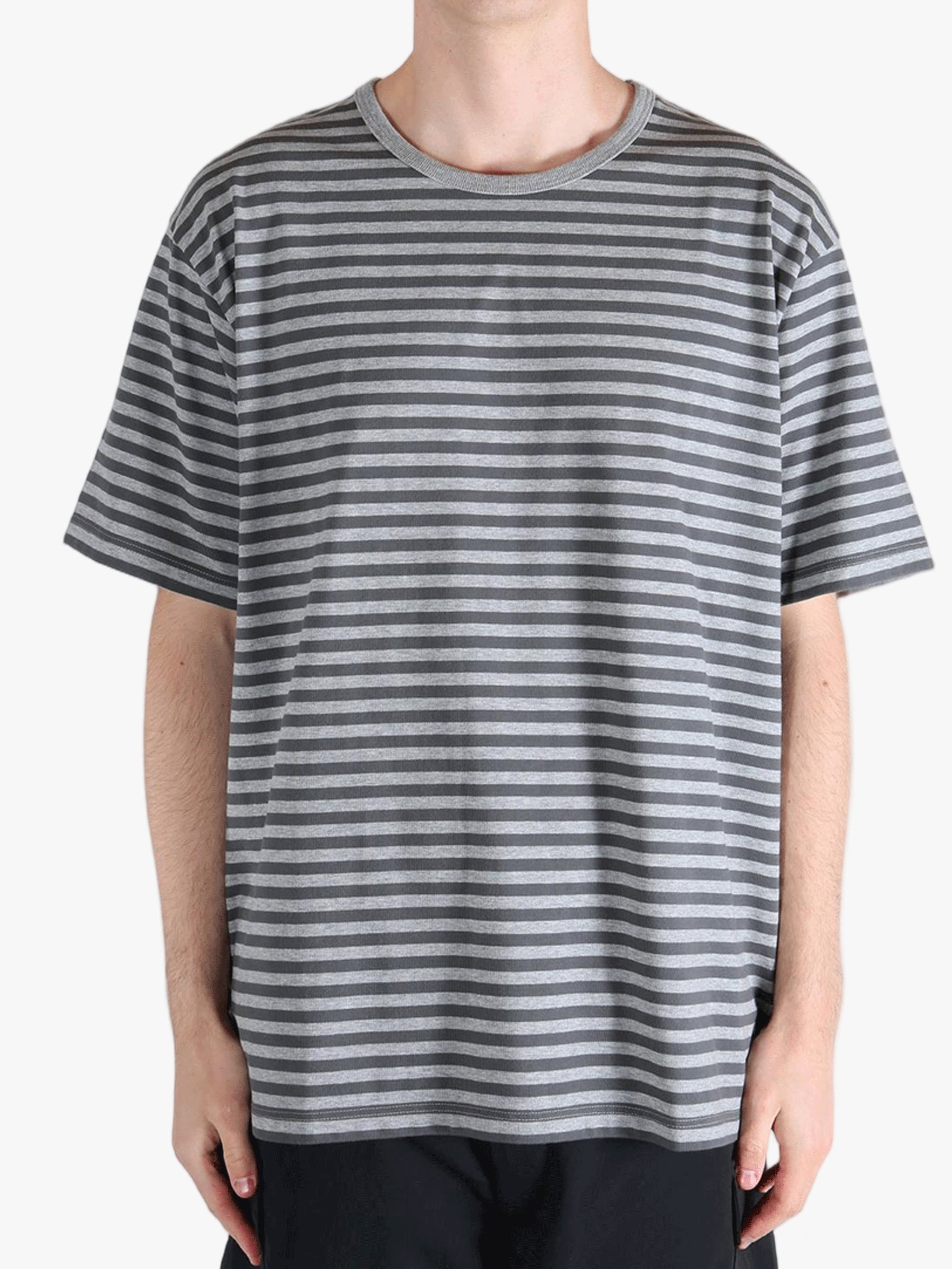 Grey t-shirt worn by a person, showing the t-shirt fit