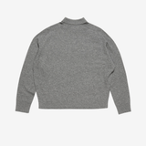 Grey knitwear, back view
