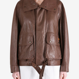 Brown jacket worn by a person, showing the jacket fit