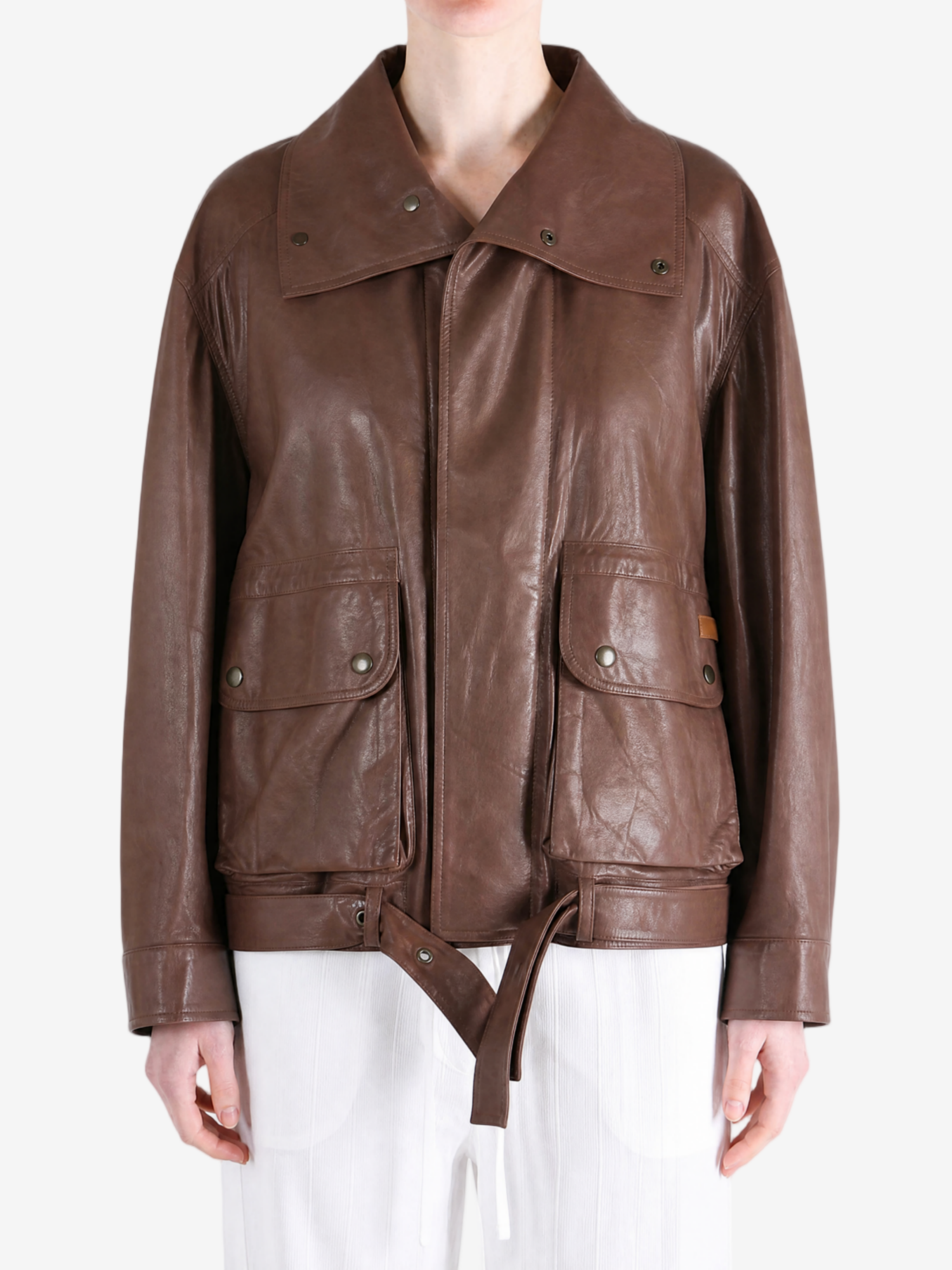 Brown jacket worn by a person, showing the jacket fit
