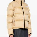 Tan jackets worn by a person, showing the  jackets fit