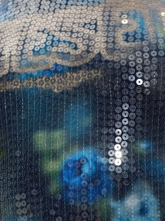 Close up of blue top, showing texture of the Polyamide fabric
