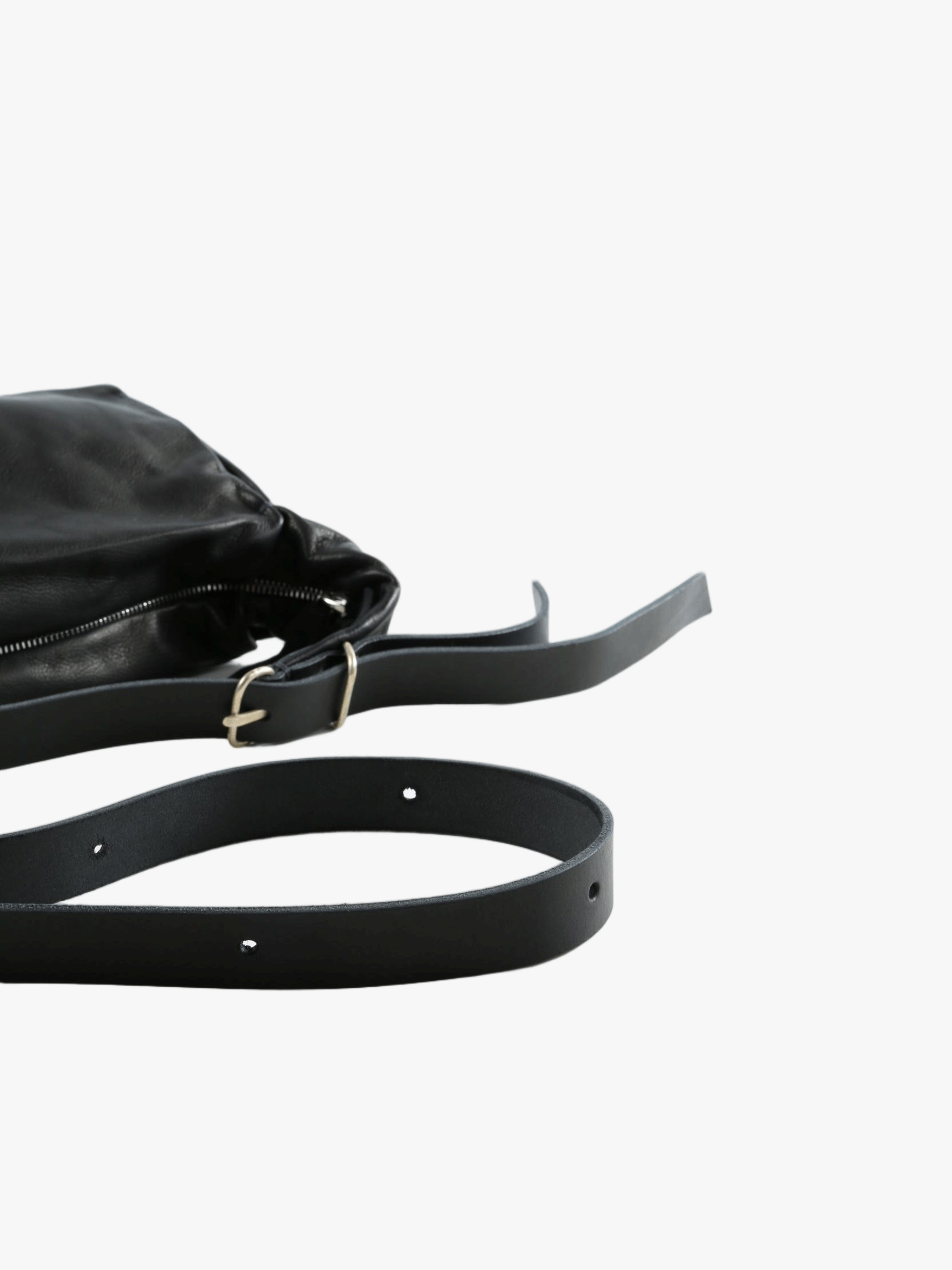 Close-up of black bag, showing texture of the fabric