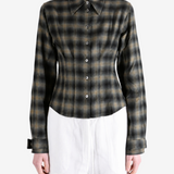 Brown shirt worn by a person, showing the shirt fit
