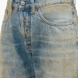 Close up of blue jeans, showing texture of the blended fabric