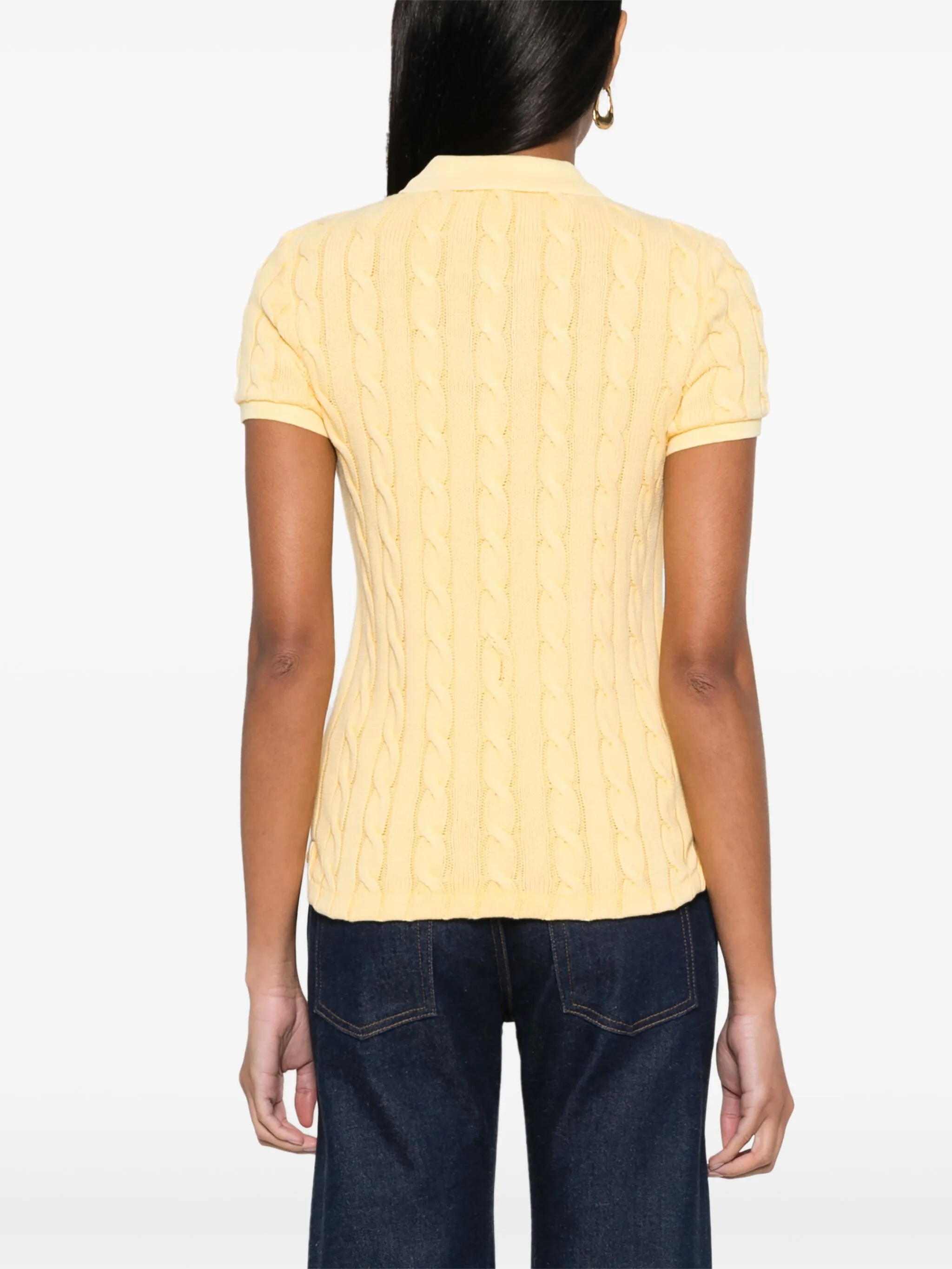yellow shirt worn by a person, showing the shirt's fit

