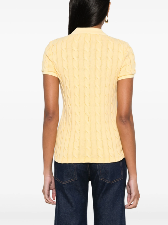 yellow shirt worn by a person, showing the shirt's fit
