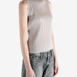 Grey tops worn by a person, showing the  tops fit