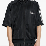 black jackets-coats worn by a person, showing the  jackets-coats fit