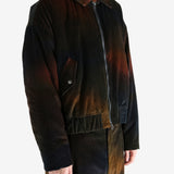 Black jacket worn by a person, showing the jacket's fit