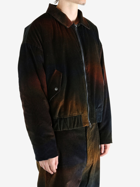Black jacket worn by a person, showing the jacket's fit