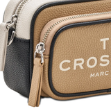 Close up of tan bags, showing texture of the split cow leather and polyurethane coating fabric