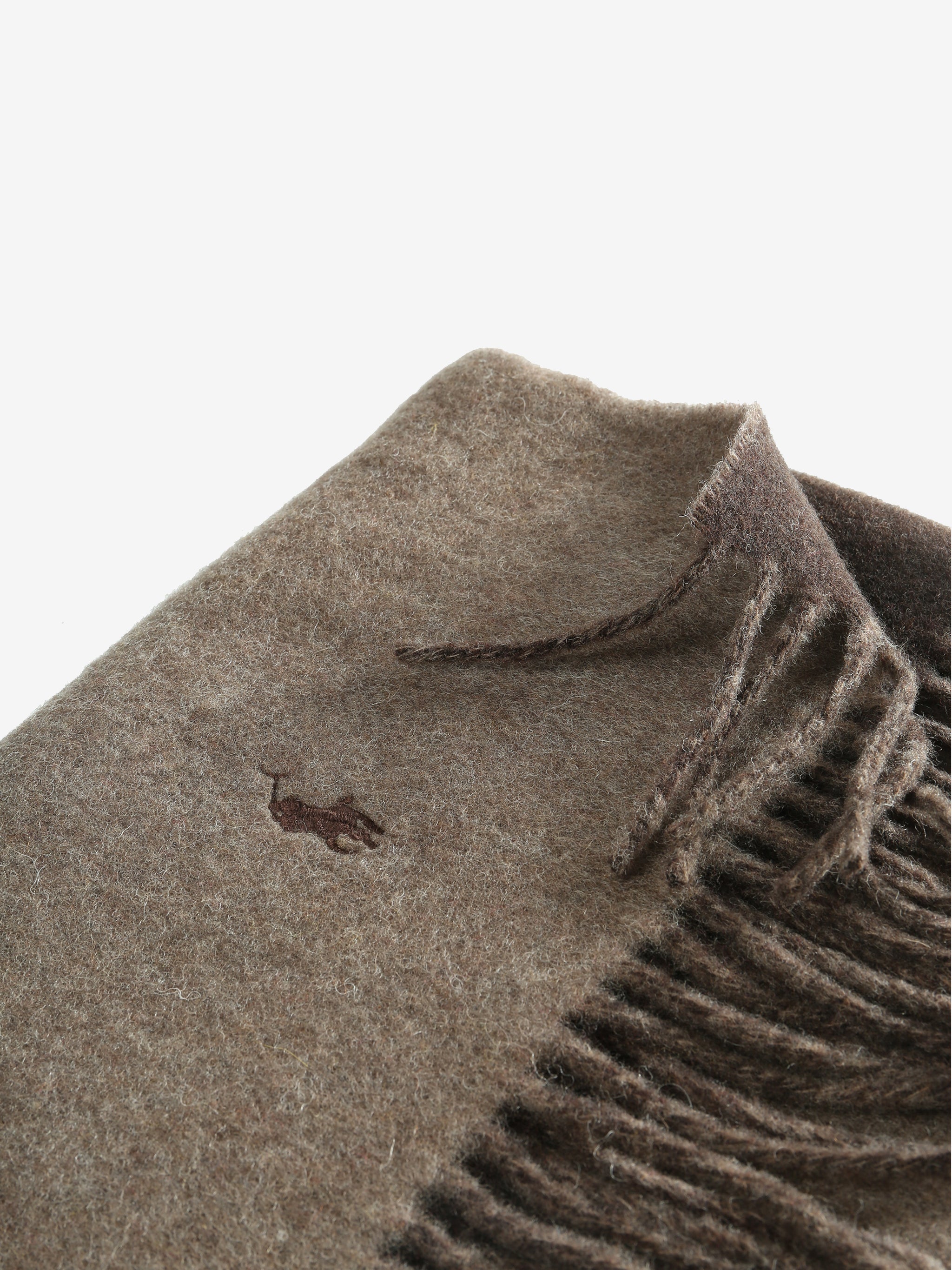 Close up of brown scarves, showing texture of the recycled wool and wool fabric