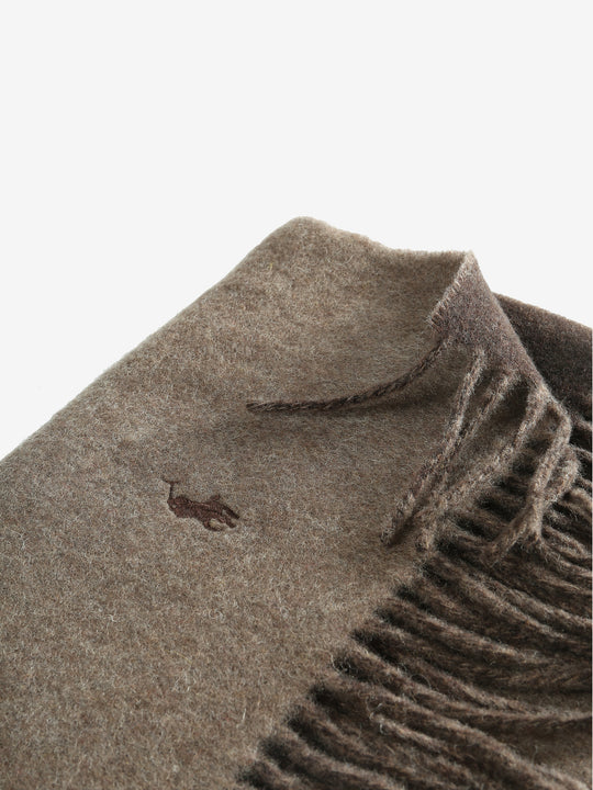 Close up of brown scarves, showing texture of the recycled wool and wool fabric