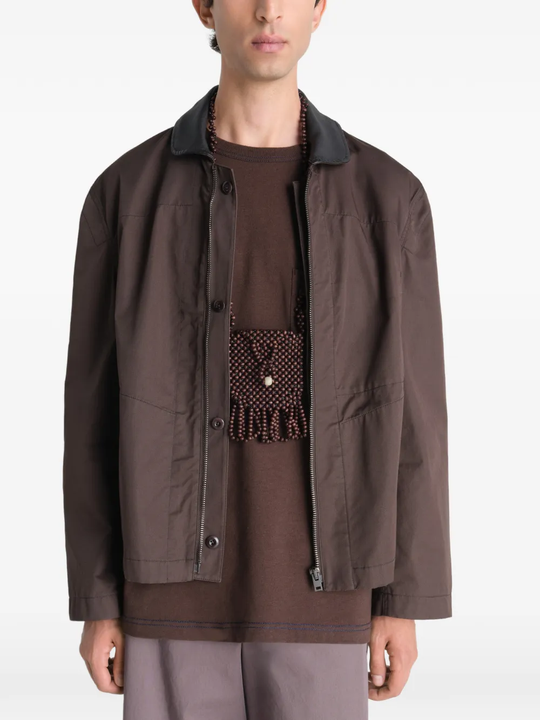 Brown bag worn by a person, showing the bag fit
