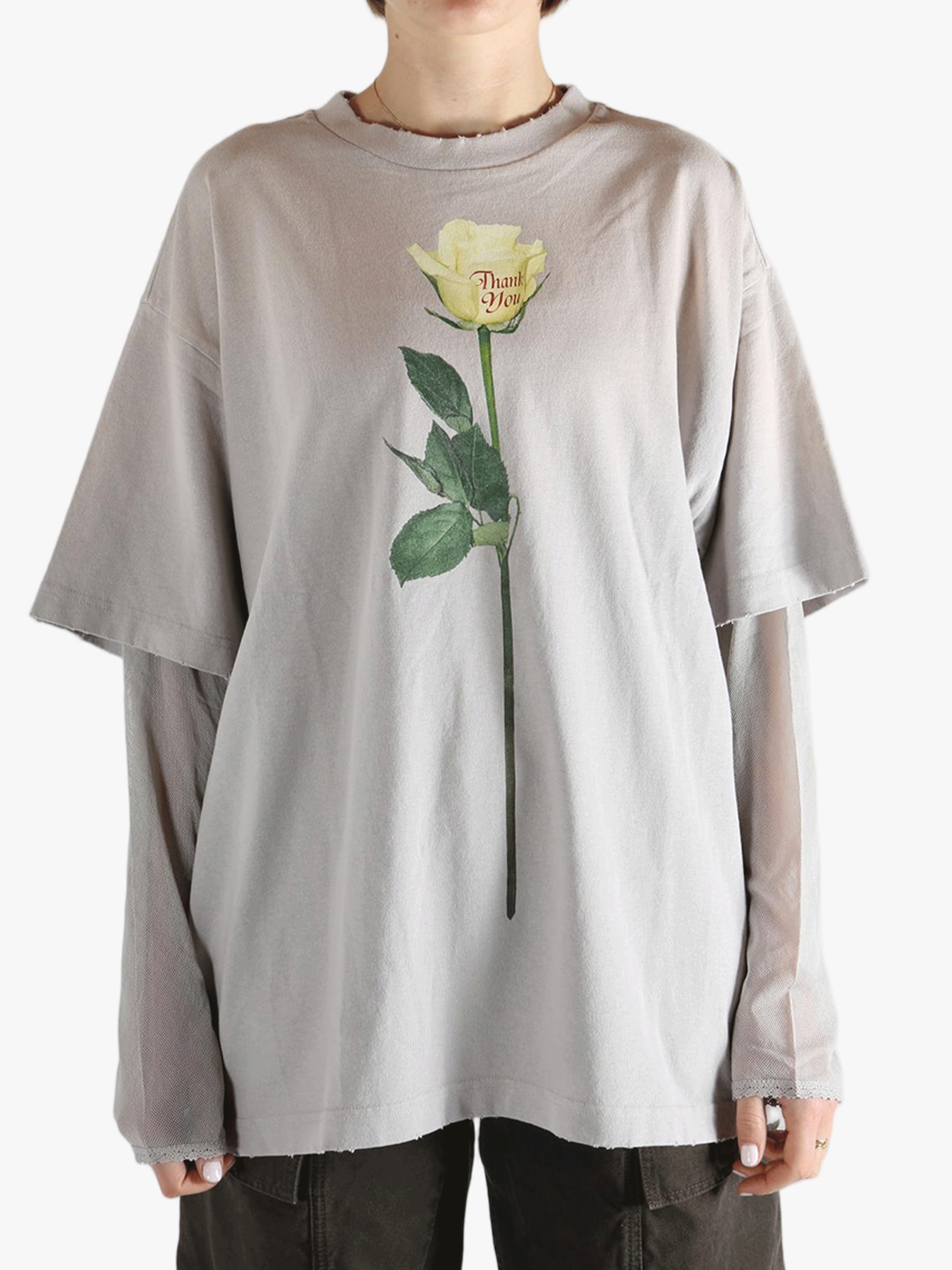 Grey T-shirt worn by a person, showing the T-shirt's fit