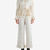 White tops worn by a person, showing the tops's fit