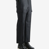 Black pant worn by a person, showing the pant's fit