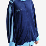 Blue jacket worn by a person, showing the jacket's fit