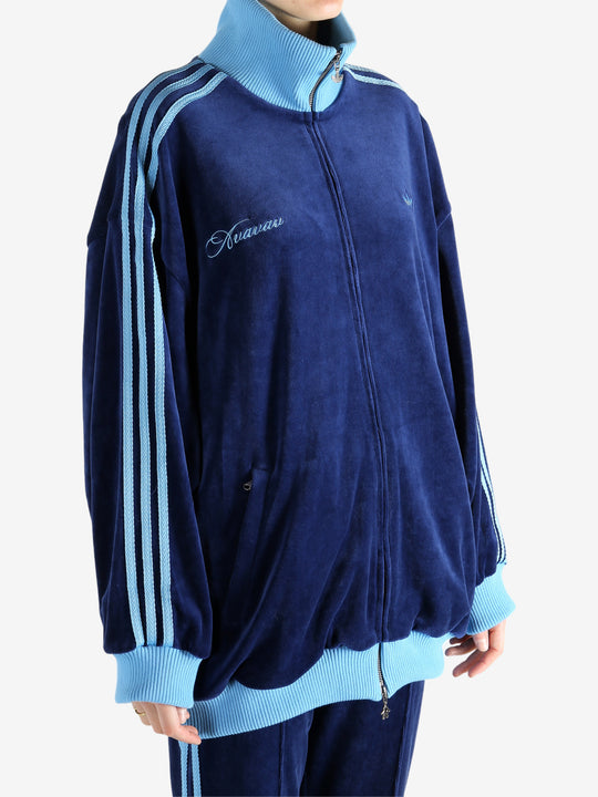 Blue jacket worn by a person, showing the jacket's fit