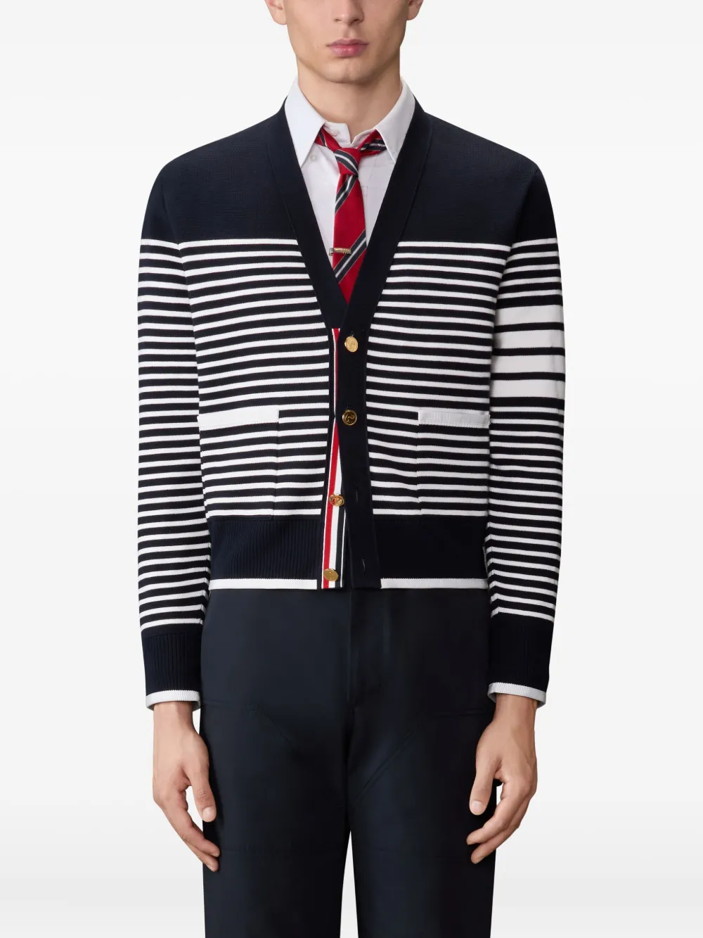 Black cardigan worn by a person, showing the cardigan fit