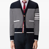 Black cardigan worn by a person, showing the cardigan fit