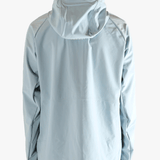 Blue jacket worn by a person, showing the jacket's fit