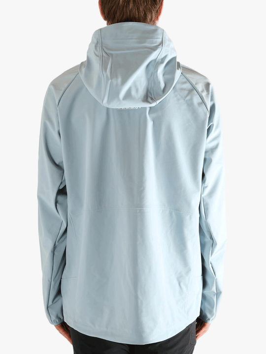 Blue jacket worn by a person, showing the jacket's fit