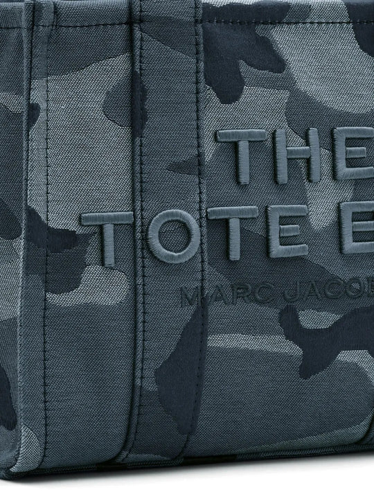 Close up of blue bag, showing texture of the cotton fabric