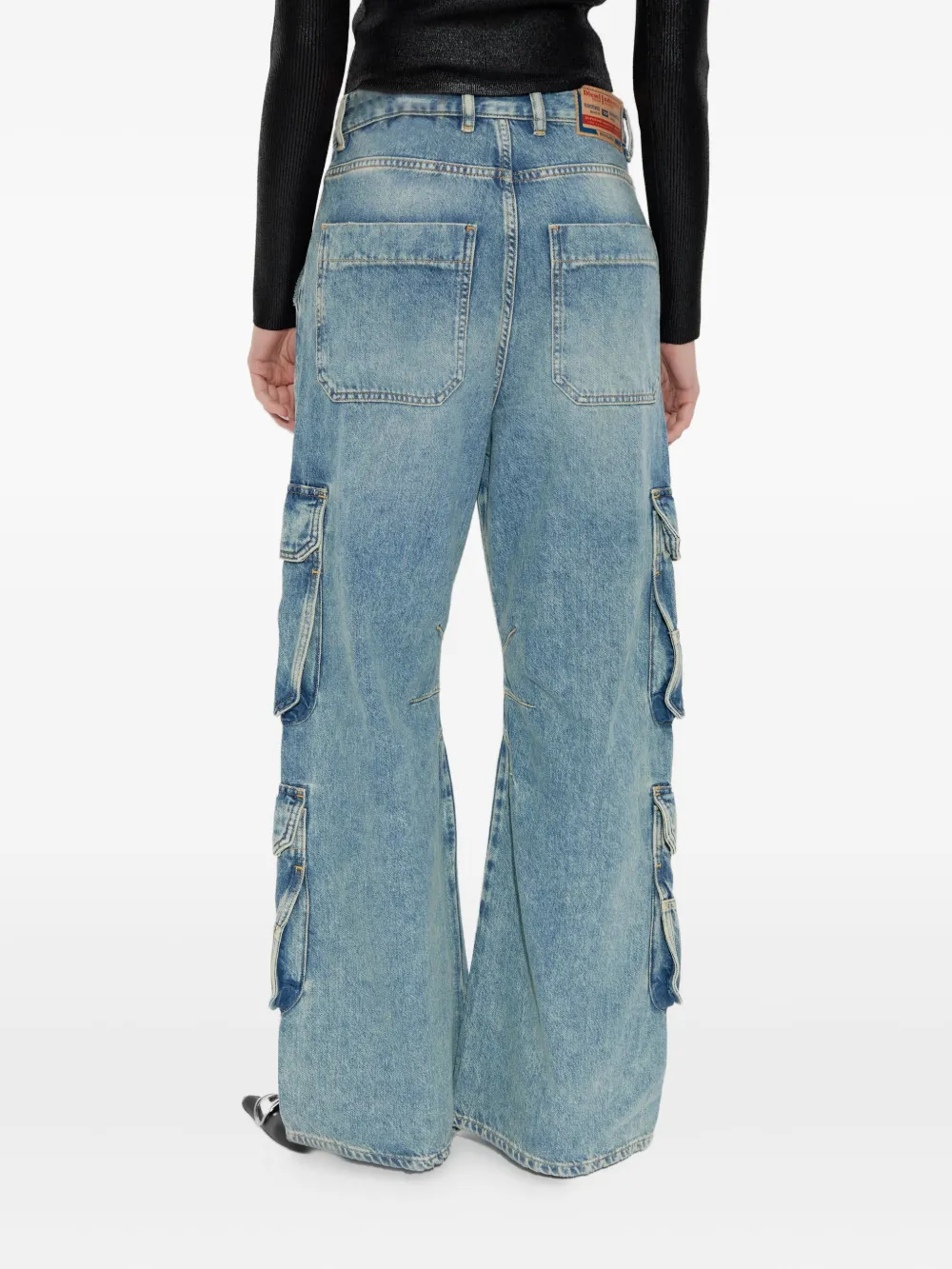 Blue pants worn by a person, showing the pants fit