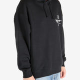 Black hoodie worn by a person, showing the hoodie's fit
