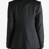 Black jacket worn by a person, showing the jacket's fit