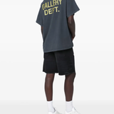 Black t-shirt worn by a person, showing the t-shirt's fit