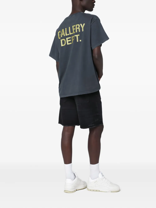 Black t-shirt worn by a person, showing the t-shirt's fit