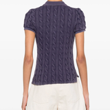 blue shirt worn by a person, showing the shirt's fit
