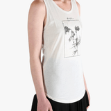 White top worn by a person, showing the top's fit