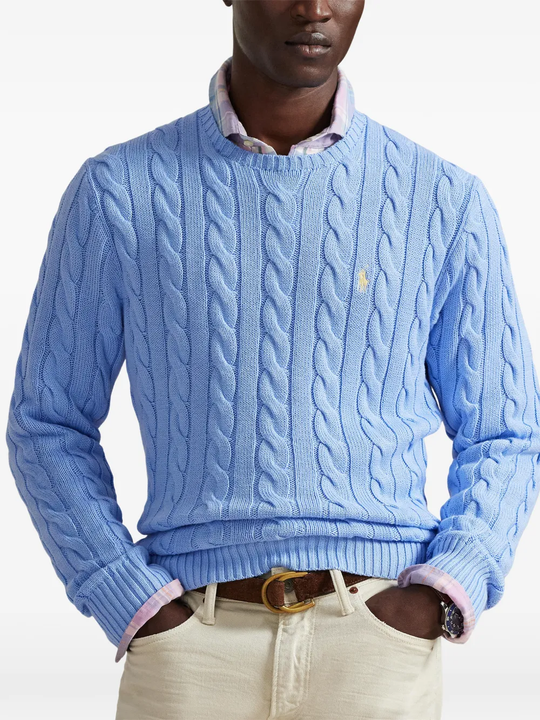 Blue sweater worn by a person, showing the sweater fit